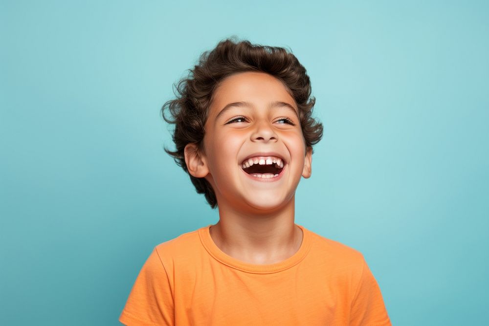 Boy laughing smiling smile. AI generated Image by rawpixel.