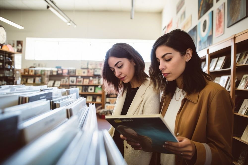 Two hispanic women publication bookstore reading. AI generated Image by rawpixel.