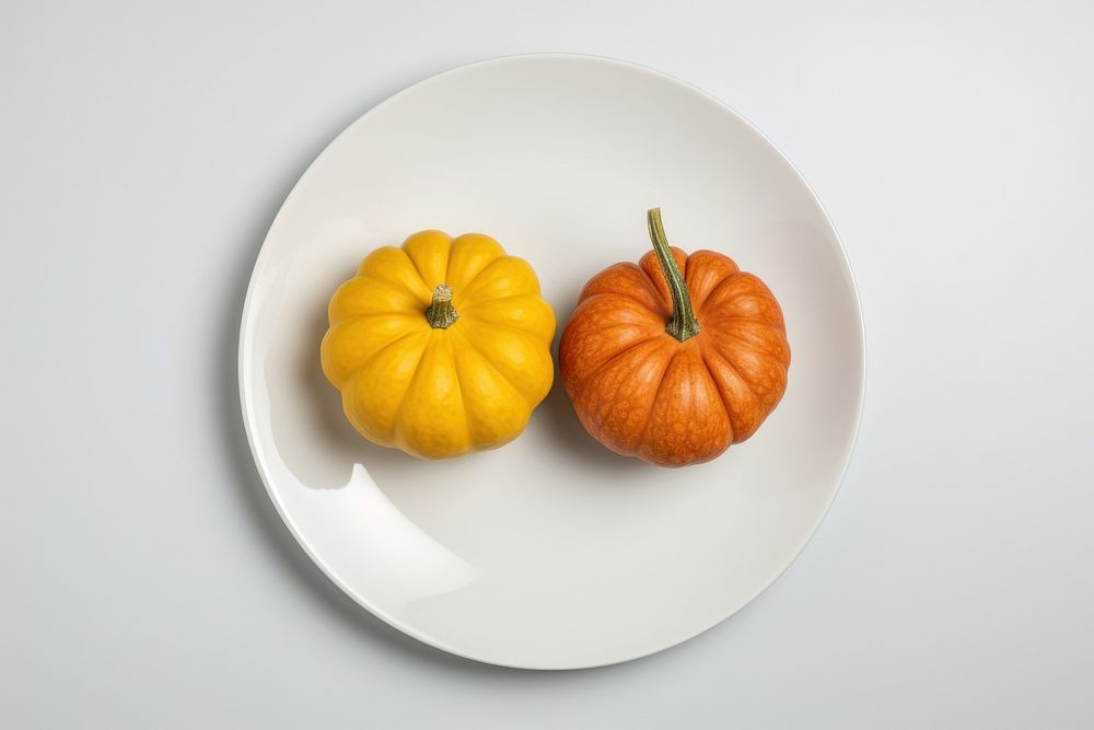 Pumpkins white plate food vegetable. AI generated Image by rawpixel.