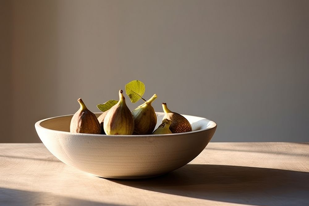 Ceramic bowl plant table fruit. 