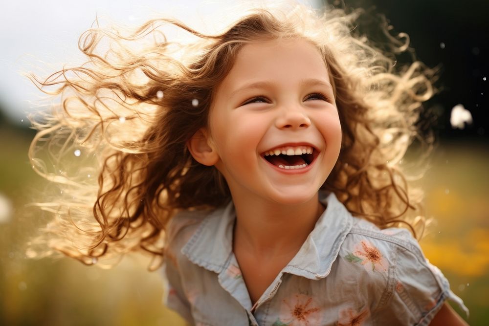 Little girl laughing summer child. 