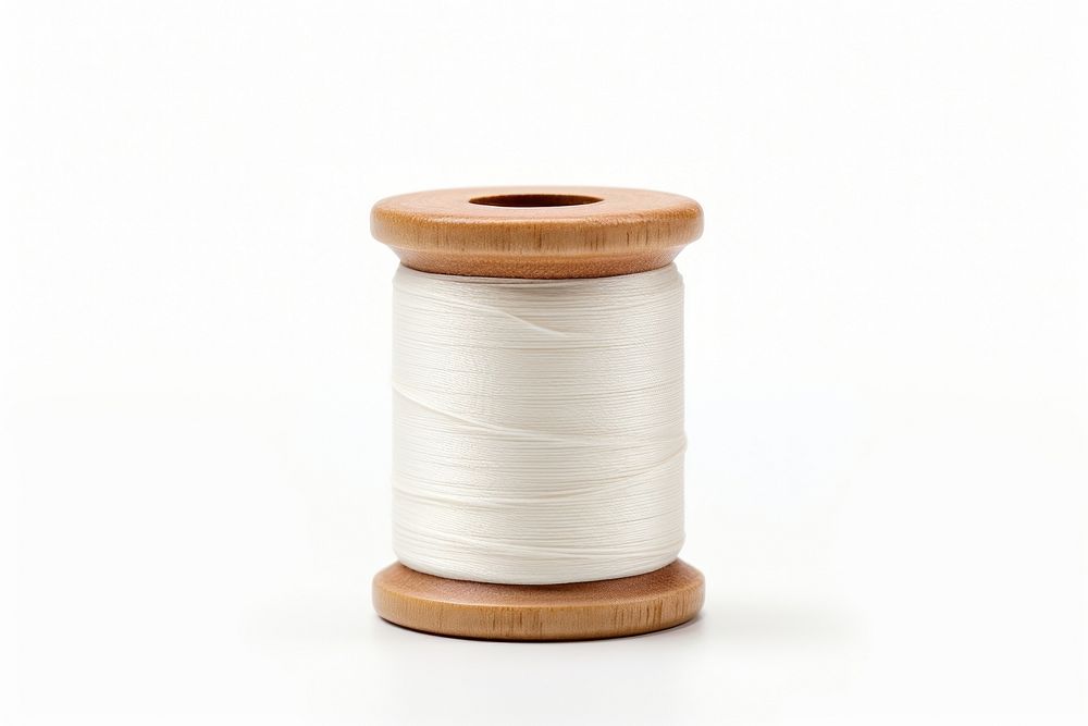 Thread spool white white background. AI generated Image by rawpixel.