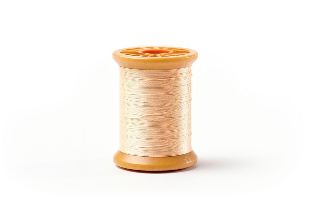 Thread spool white background material. AI generated Image by rawpixel.