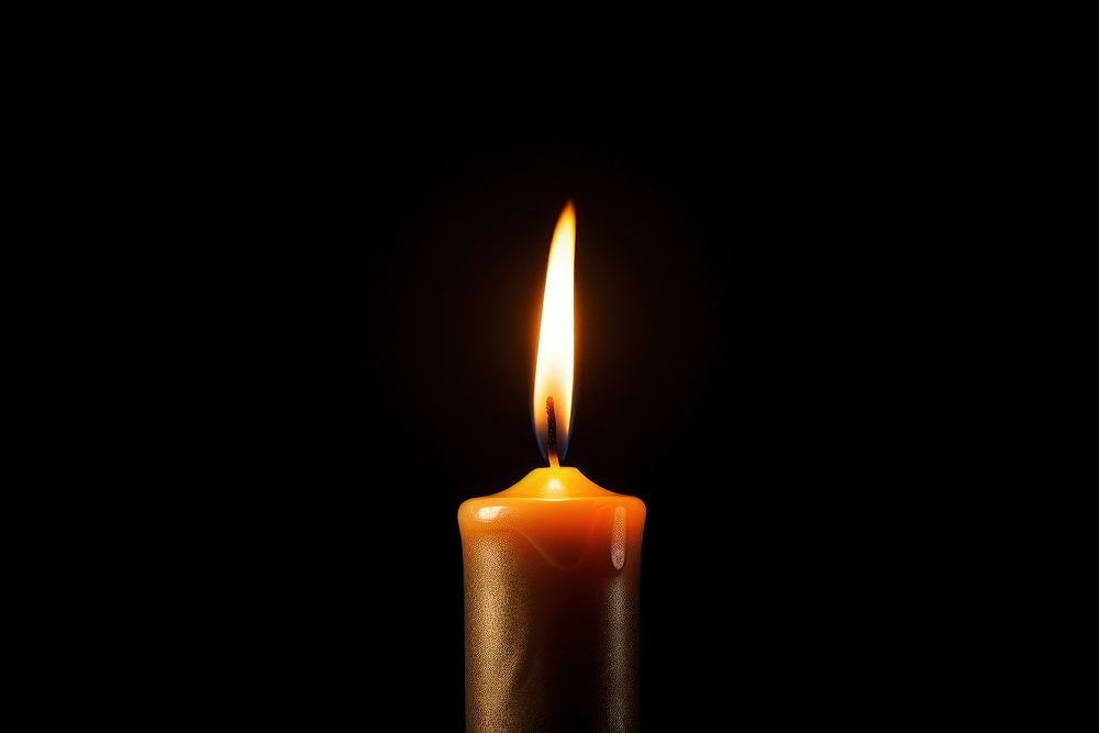 Candle light black fire black background. 