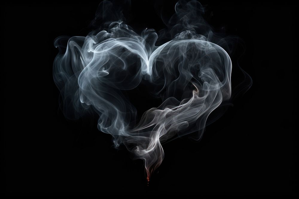 Smoke effect black black background heart shape. 