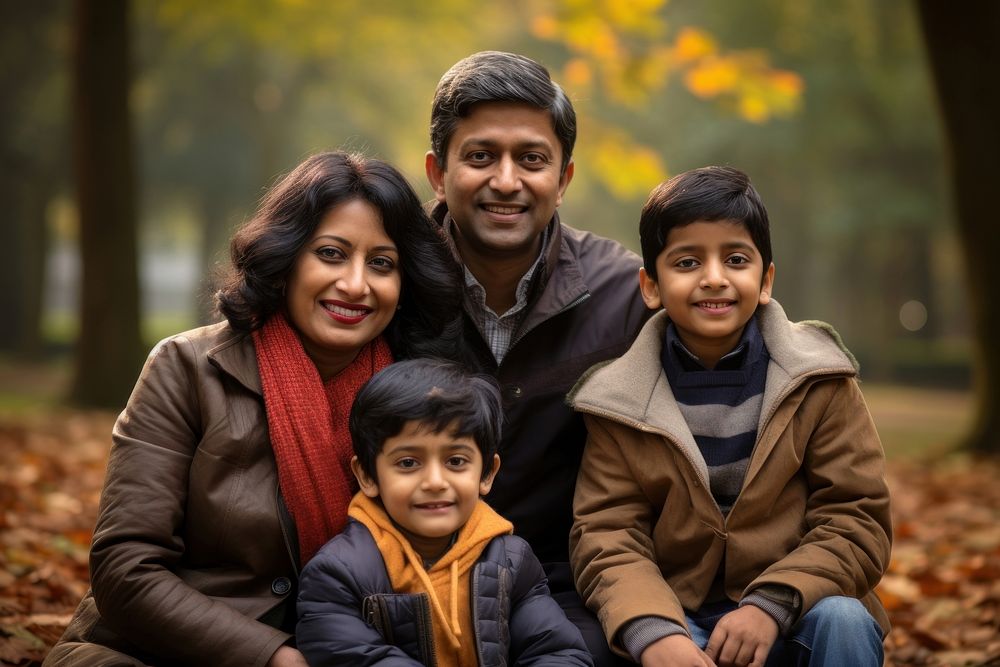 Indian family portrait jacket adult. AI generated Image by rawpixel.