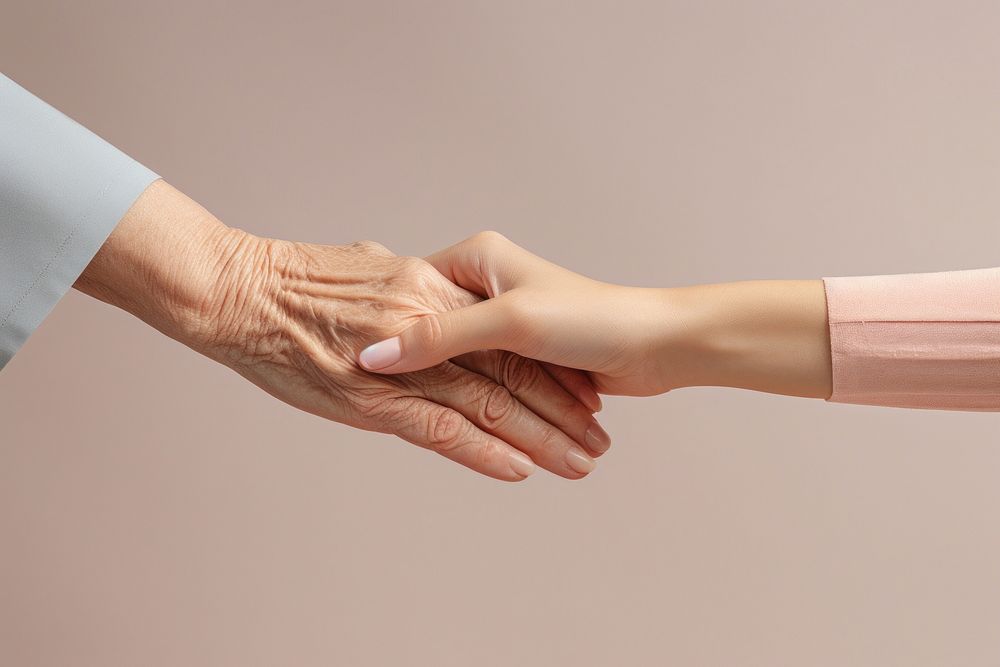 Women holding old woman hand togetherness handshake agreement. AI generated Image by rawpixel.