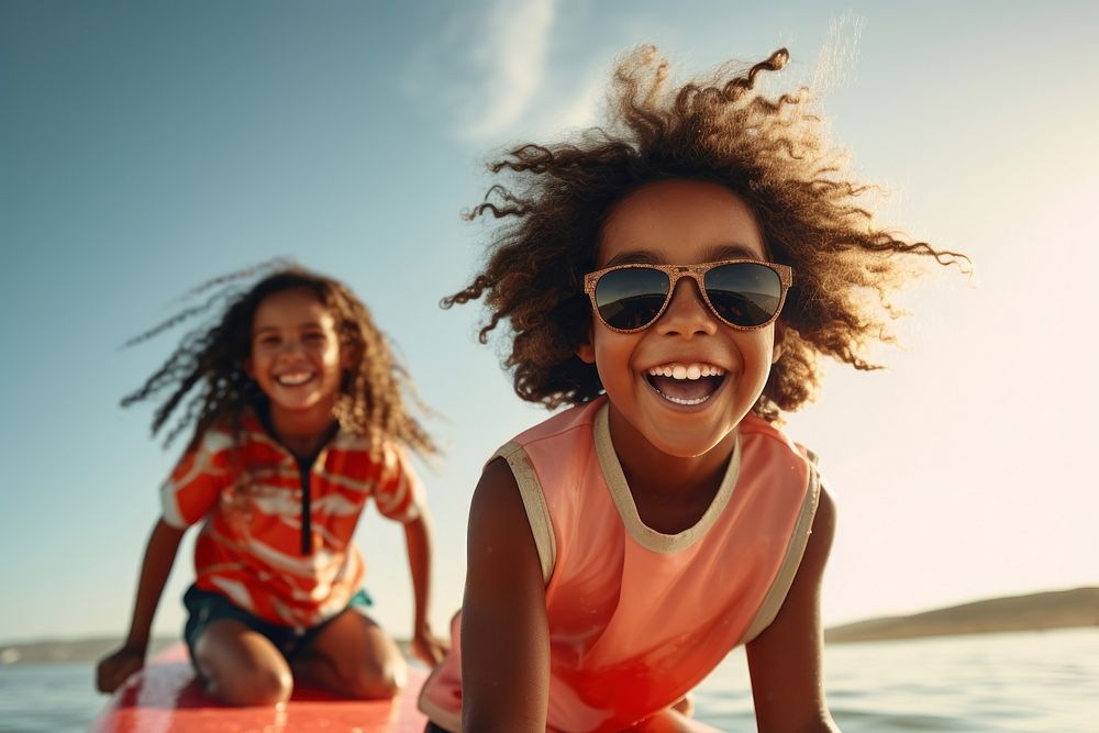 Two diversity cool kids surfing smile laughing fun. AI generated Image by rawpixel.