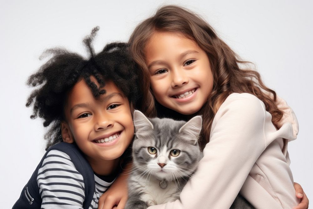 Kids hugging a cat photography portrait mammal. AI generated Image by rawpixel.