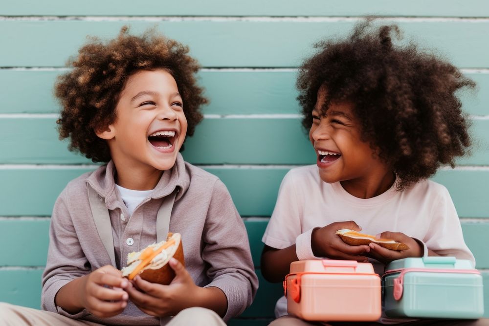 Two diversity kids having lunch box laughing smile child. AI generated Image by rawpixel.