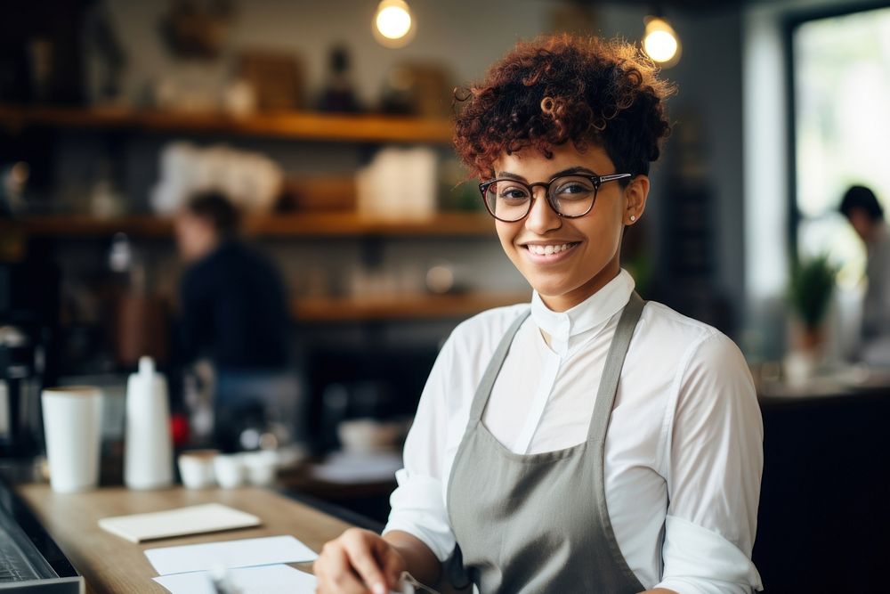 Latin Female Barista With Short Hair Making A Cup Of latte barista female adult. AI generated Image by rawpixel.