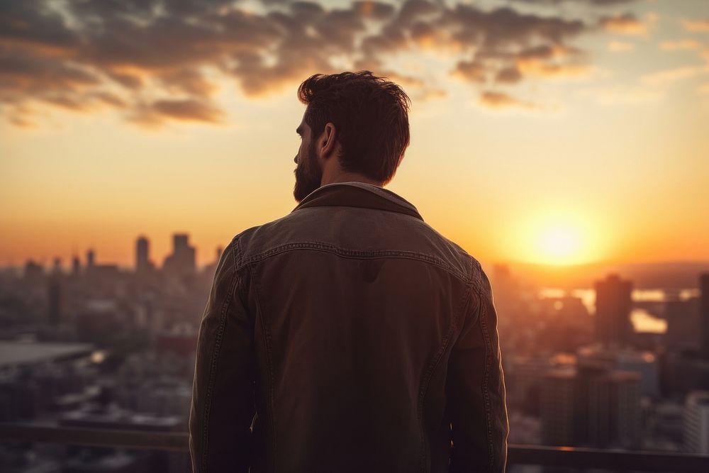 Man portrait sunset city architecture. 