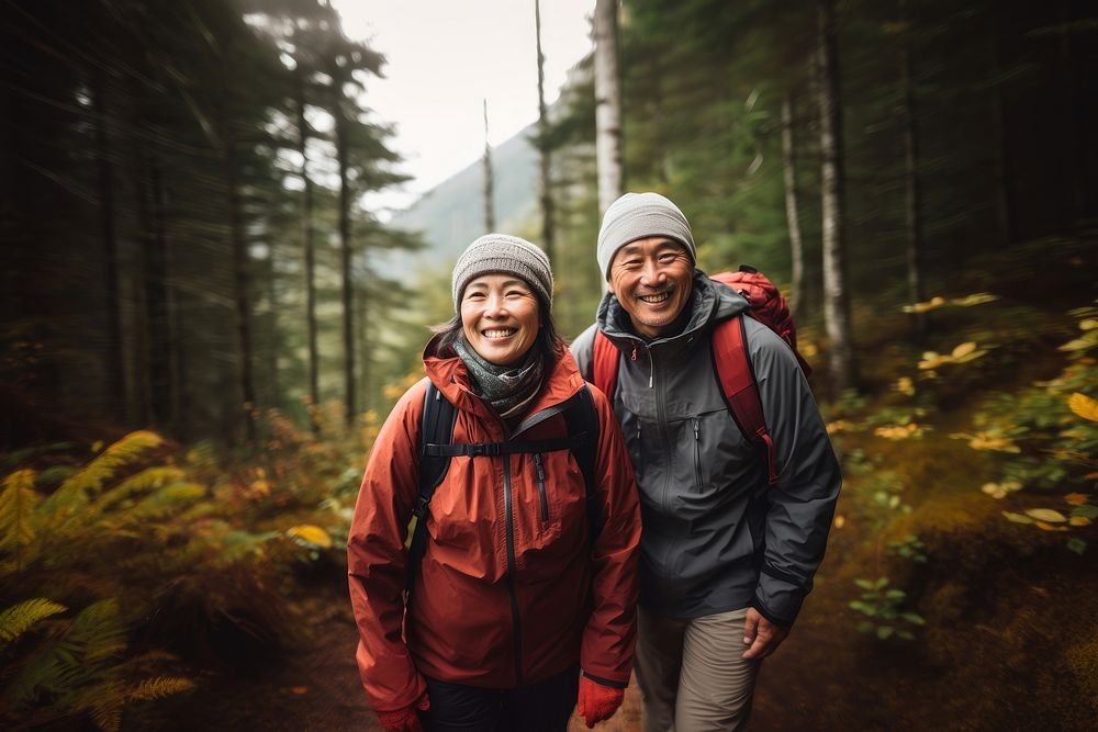 Mature asian couple walking recreation adventure. AI generated Image by rawpixel.