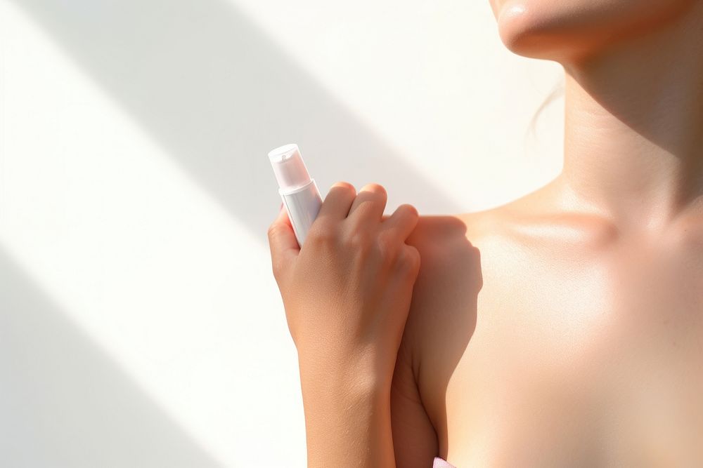 Woman applying sunscreen cosmetics adult hand. AI generated Image by rawpixel.