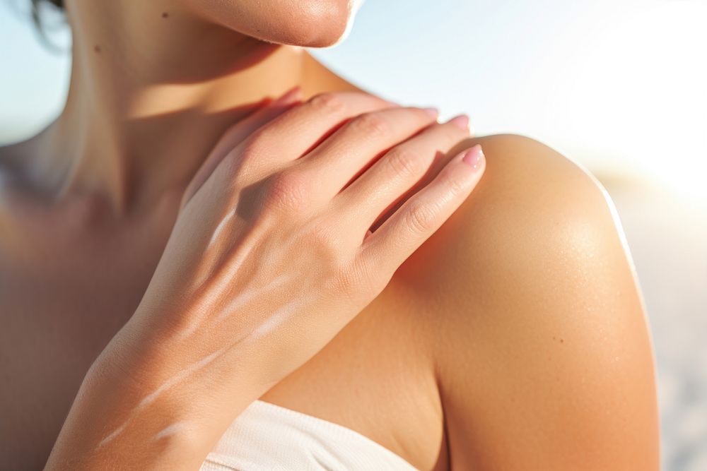 Woman applying sunscreen adult skin back. AI generated Image by rawpixel.