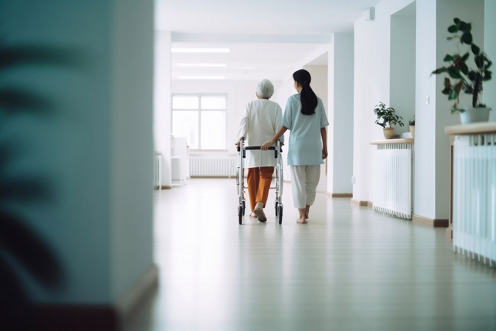 minimal, photo of nurse supporting old woman patient with orthopedic problem to walk in hospital. AI generated Image by…