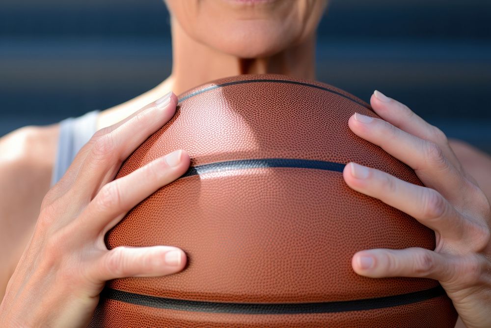 Woman holding basketball sports exercising midsection. AI generated Image by rawpixel.