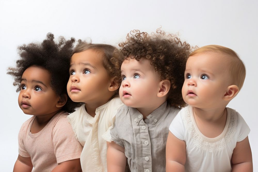 Five mixed race babies portrait looking photo. 