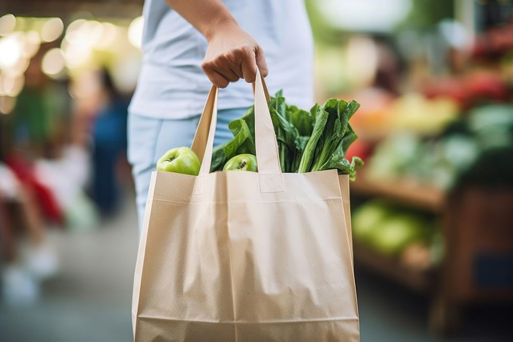 Shopping bag vegetable holding market. AI generated Image by rawpixel.