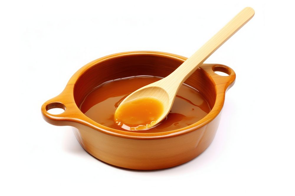 Caramel sauce spoon bowl dish. AI generated Image by rawpixel.
