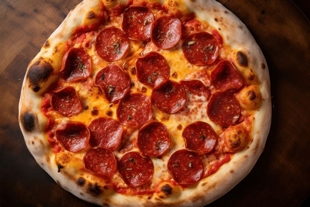 Pepperoni sourdough pizza food mozzarella vegetable. AI generated Image by rawpixel.