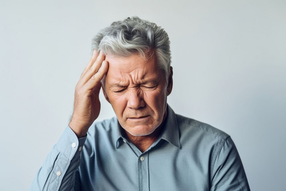 Having a headache worried adult pain. AI generated Image by rawpixel.