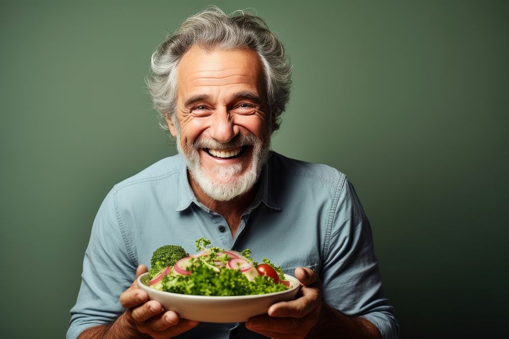 Senior man feel happy enjoy food laughing portrait.
