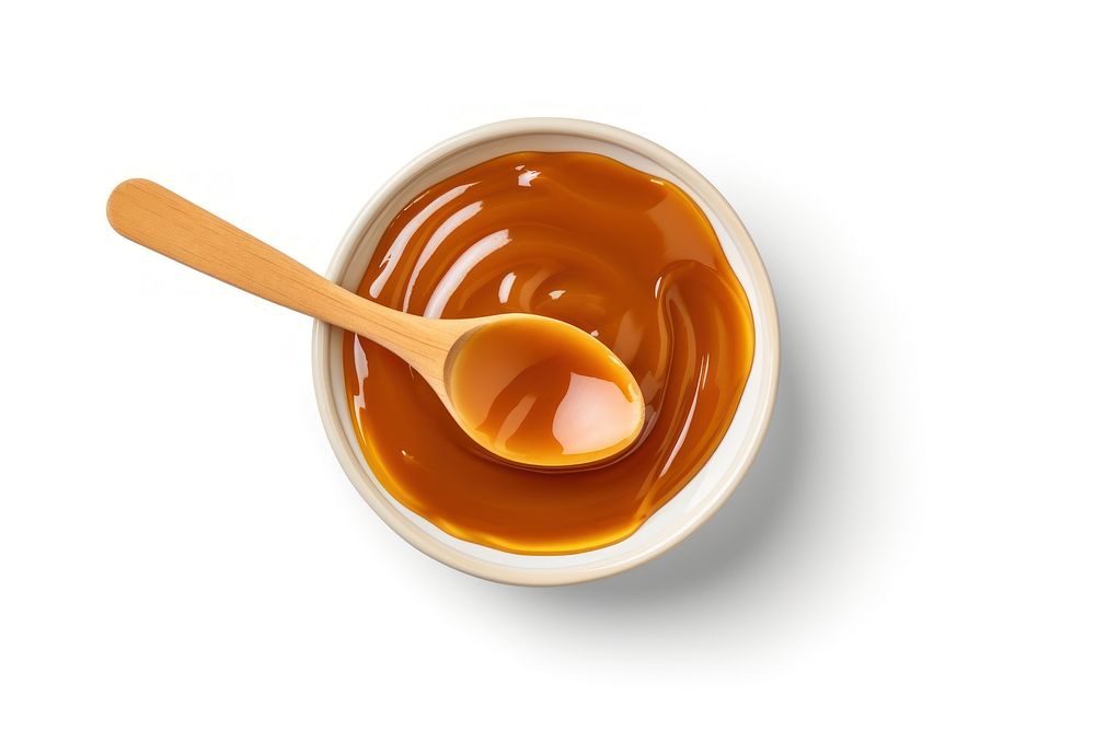 Caramel sauce dessert spoon food. AI generated Image by rawpixel.