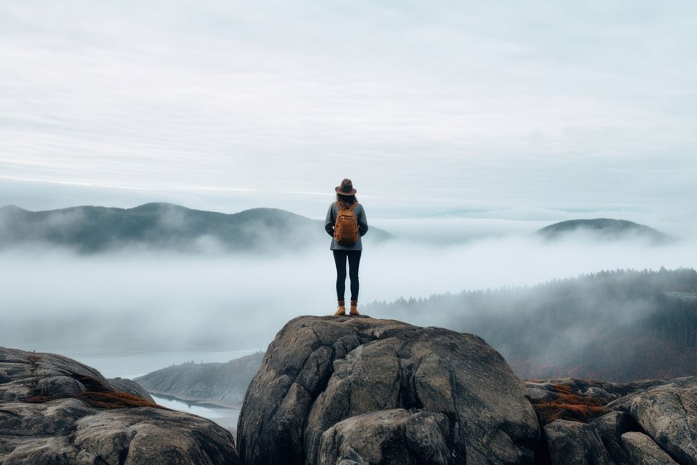 Mountain standing rock adventure. AI generated Image by rawpixel.