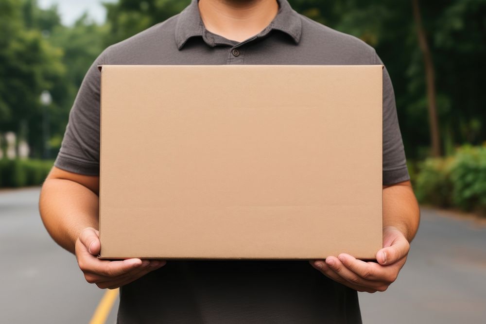 Brown paper box cardboard holding electronics. 