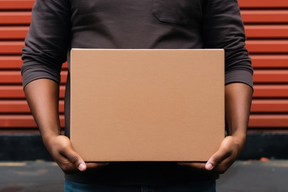 Brown paper box cardboard holding adult. AI generated Image by rawpixel.