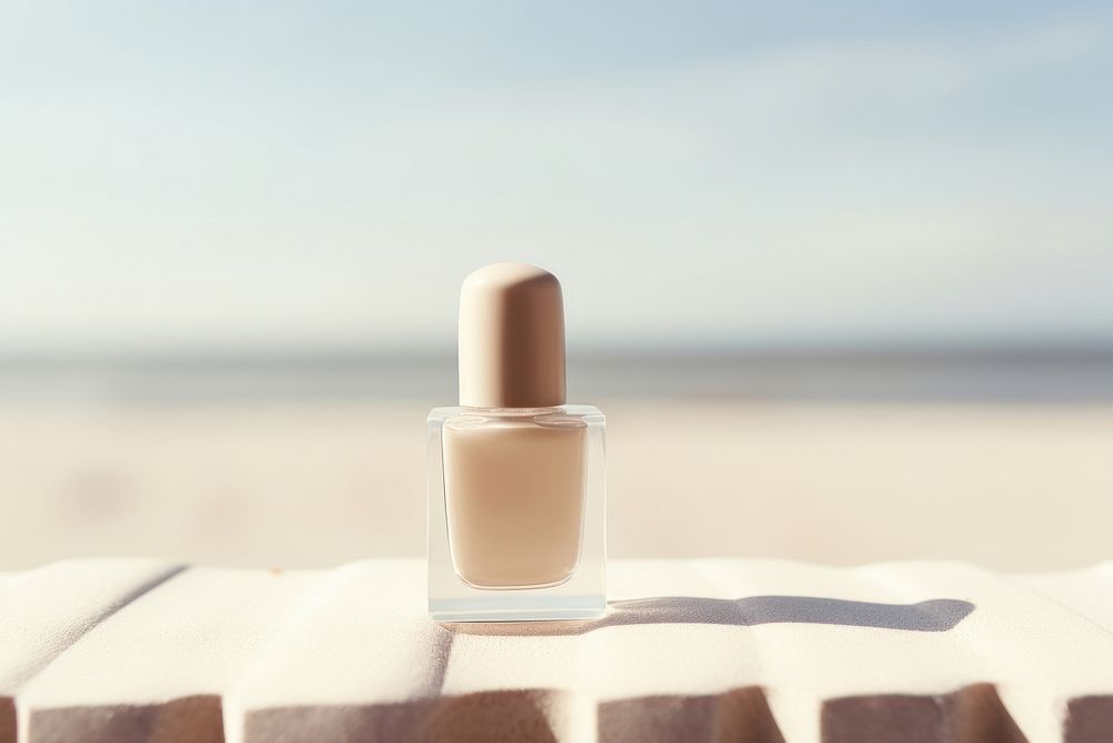 Nail polish bottle cosmetics beach day. AI generated Image by rawpixel.