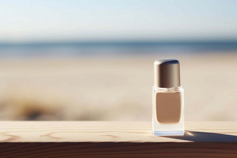 Nail polish bottle cosmetics beach table. AI generated Image by rawpixel.