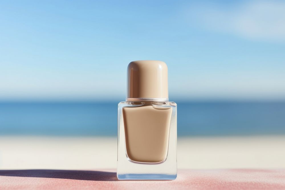 Nail polish bottle cosmetics perfume beach. 