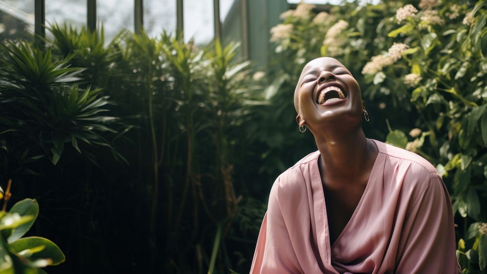 Black woman laughing plant adult relaxation. 