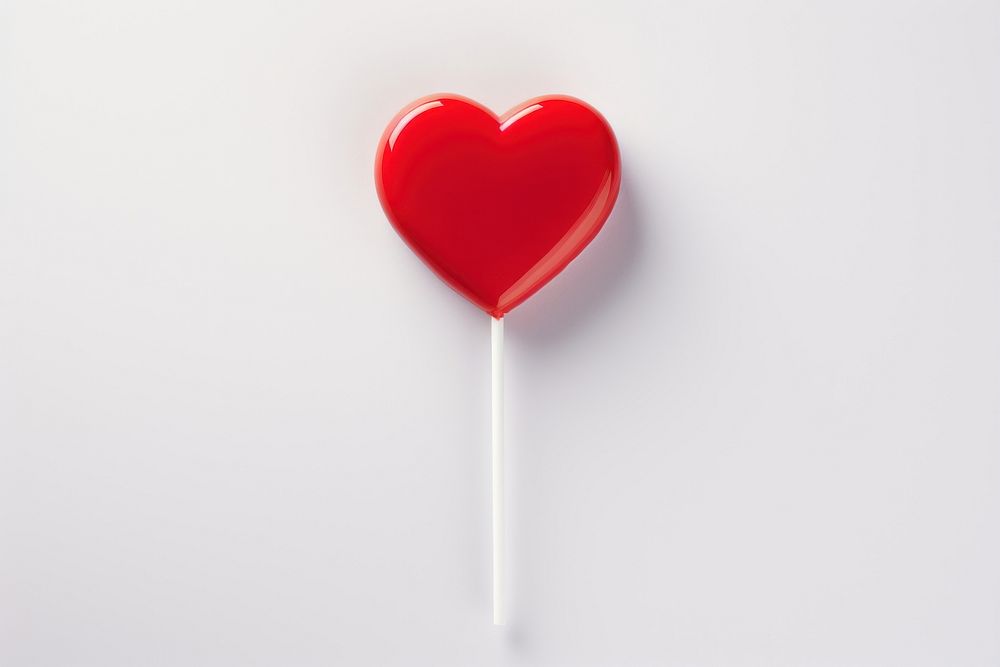 Lollipop candy heart white background. 