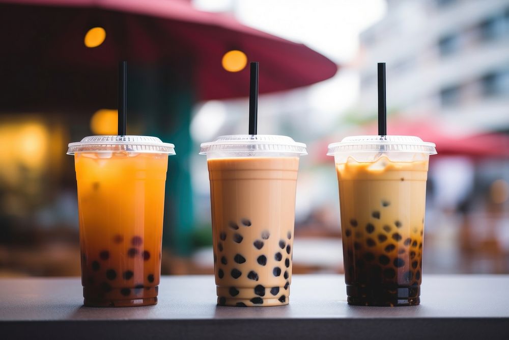 Bubble tea cup drink cafe refreshment. AI generated Image by rawpixel.