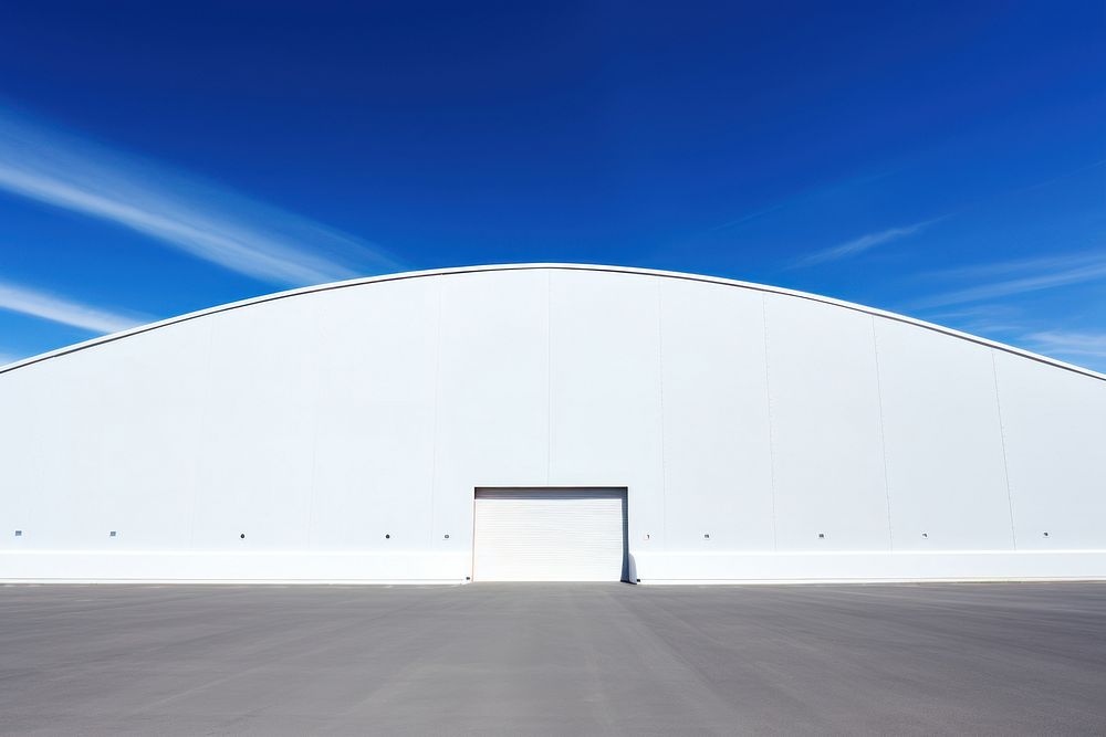 Hangar architecture building blue. AI generated Image by rawpixel.