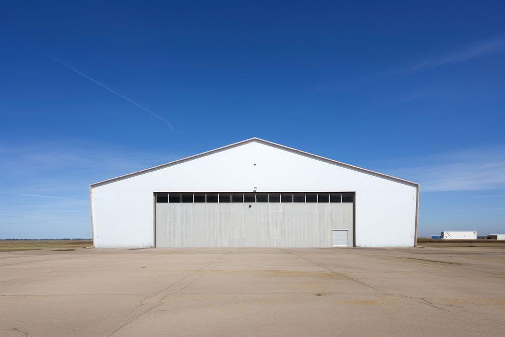 Hangar architecture building blue. AI generated Image by rawpixel.