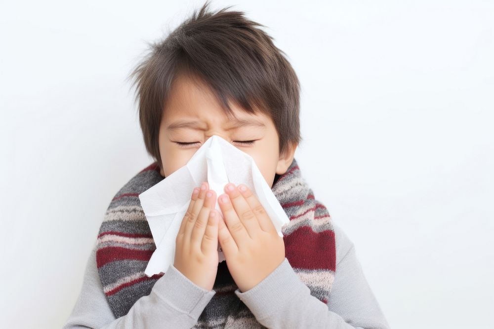 Asian boy got flu portrait headshot sneezing. AI generated Image by rawpixel.