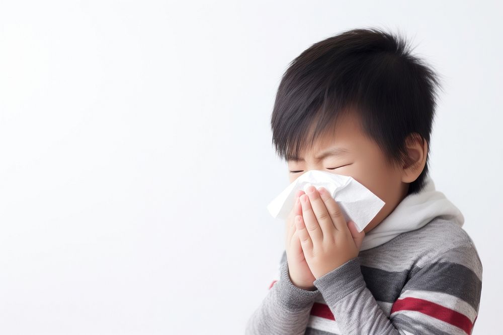 Young asian boy got flu white baby portrait. AI generated Image by rawpixel.