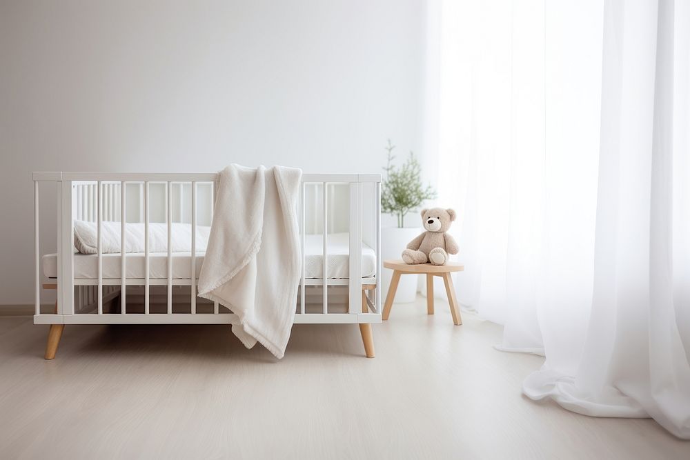 Photograph, close up shot, a white Blanket Mockup Featuring a baby crib in a Nursery room background.  