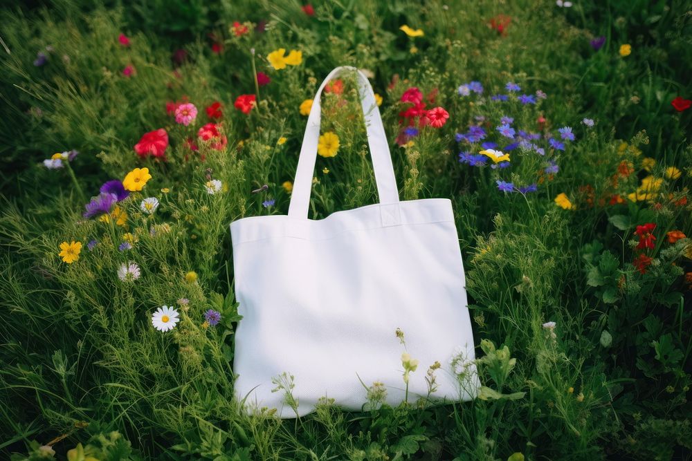 Tote bag flower handbag plant. AI generated Image by rawpixel.