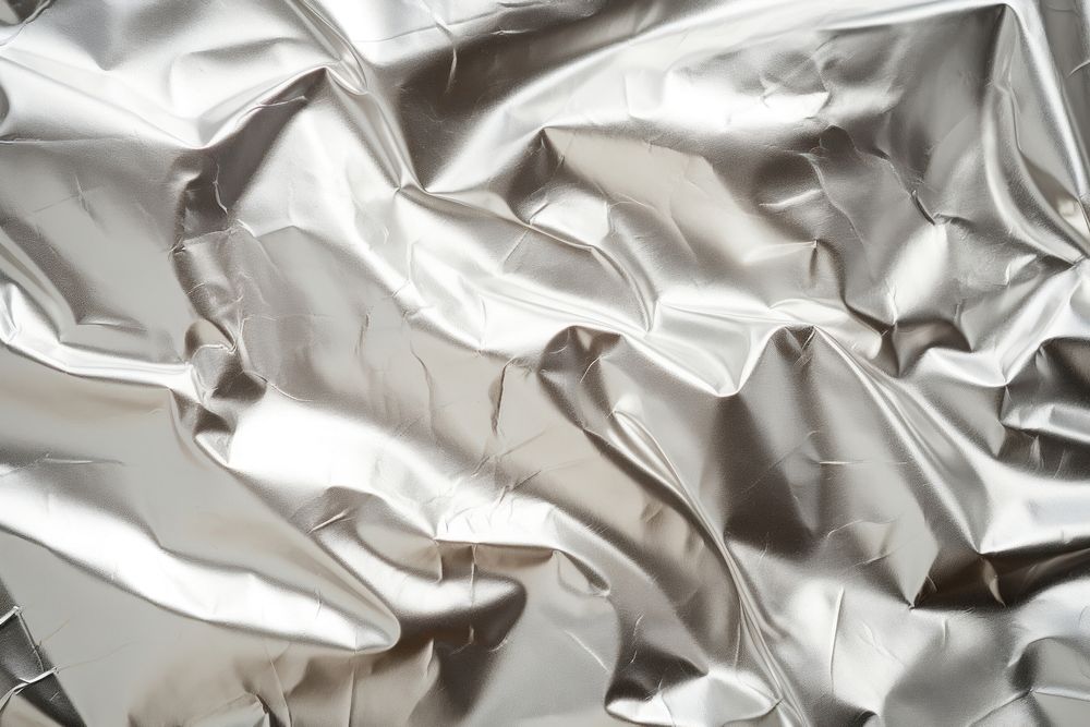Aluminum foil backgrounds textured aluminium. AI generated Image by rawpixel.