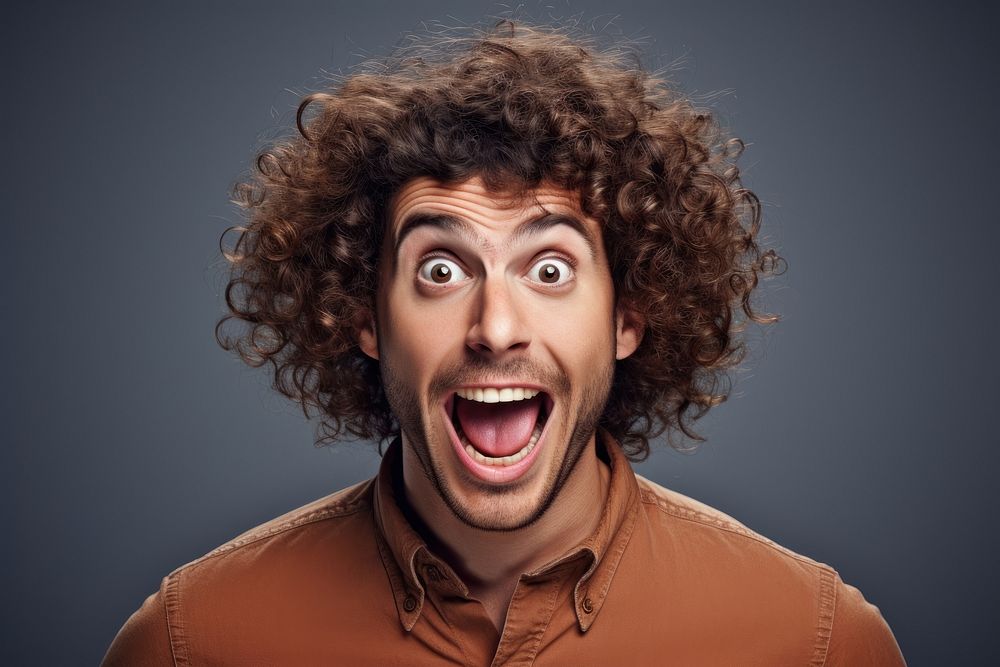 Excited curly haired man portrait adult photo. AI generated Image by rawpixel.