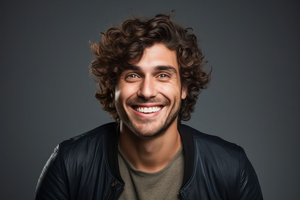 Excited curly haired man portrait adult smile. AI generated Image by rawpixel.
