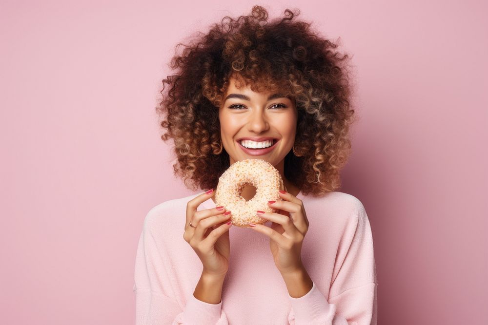 Happy young woman donuts portrait biting food. AI generated Image by rawpixel.