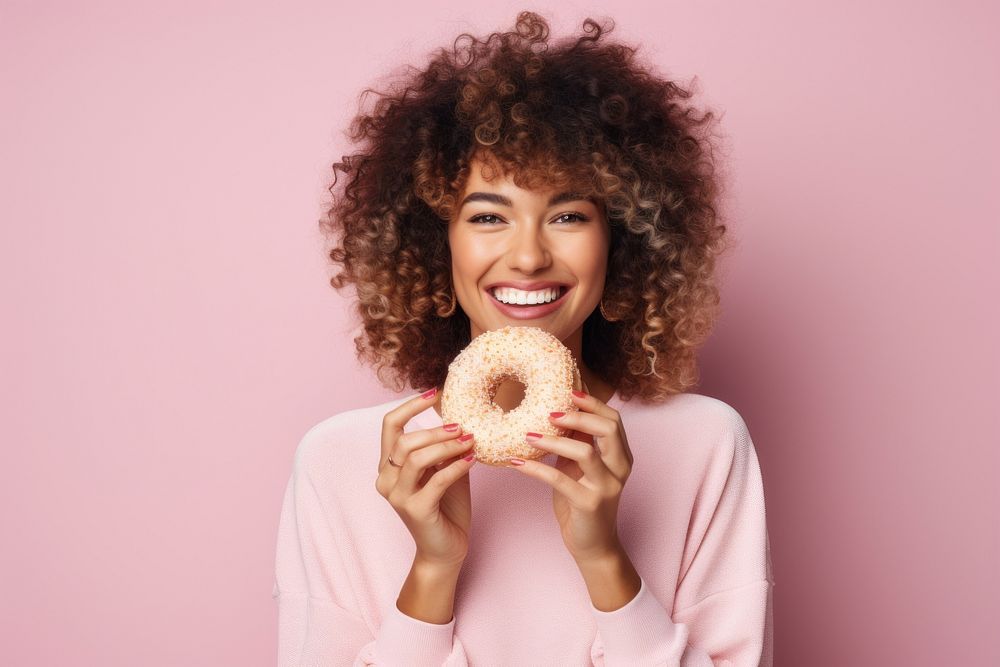 Happy young woman donuts portrait biting food. 