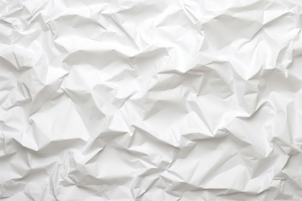 Paper sheet texture white backgrounds crumpled. 