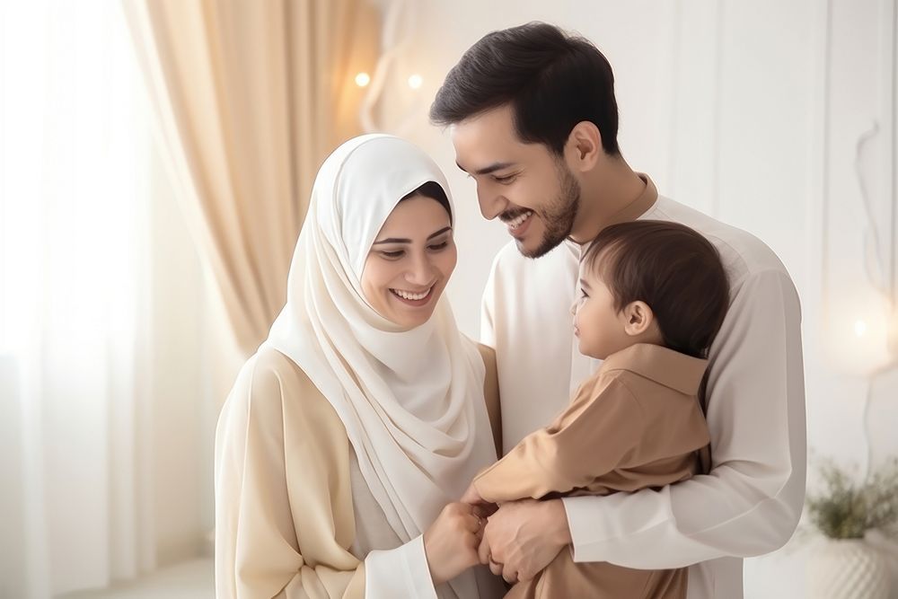 Happy Muslim family reading quran together smiling father child. AI generated Image by rawpixel.